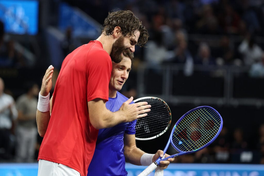 Reilly Opelka and Casper Ruud embrace after their match at the 2025 Laver Cup