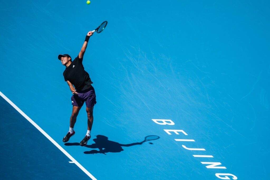 Learner Tien of the United States returns a shot in the Men's Singles Round of 16 match against Flavio Cobolli of Italy on day 7 of the 2025 China Open at National Tennis Center.