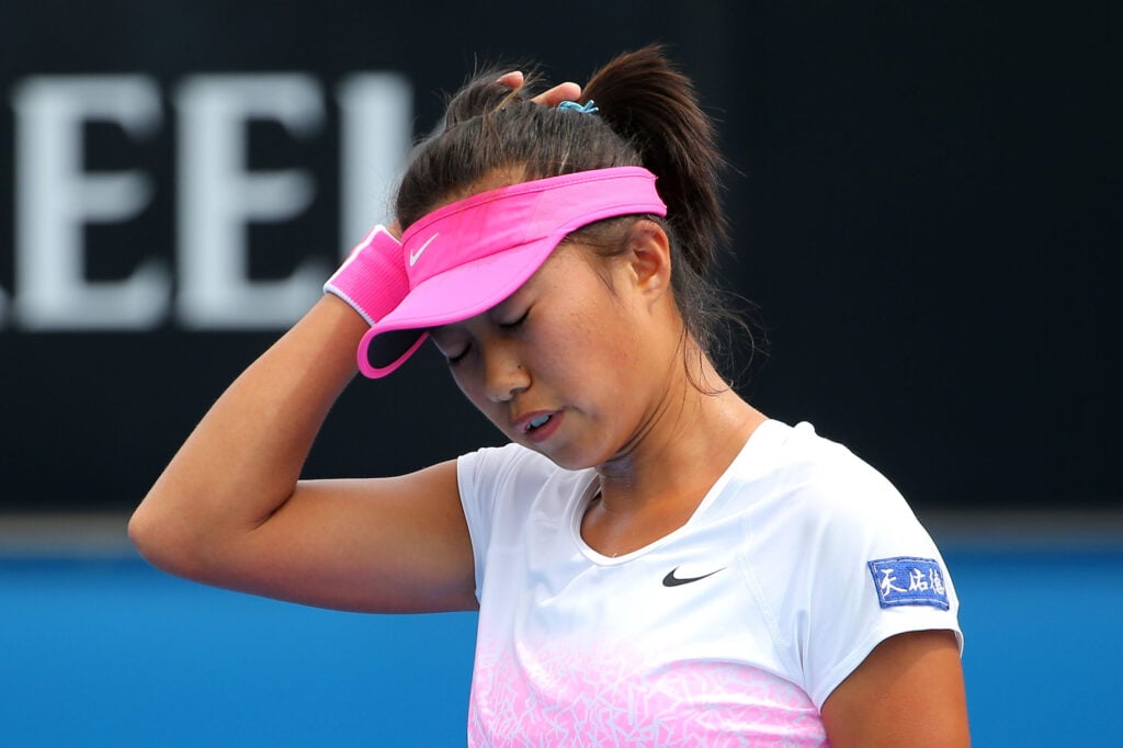 Shuai Zhang of China reacts to a point in her first round match against Alize Cornet of France during day two of the 2015 Australian Open at Melbourne Park.