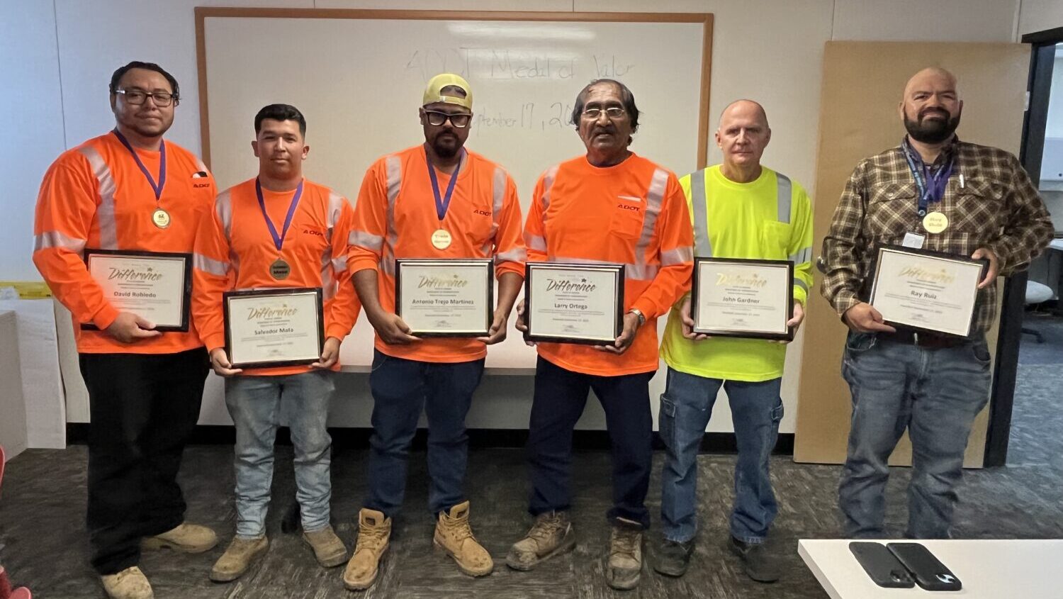 ADOT workers honored medal of valor saving woman from canal Gila Bend...