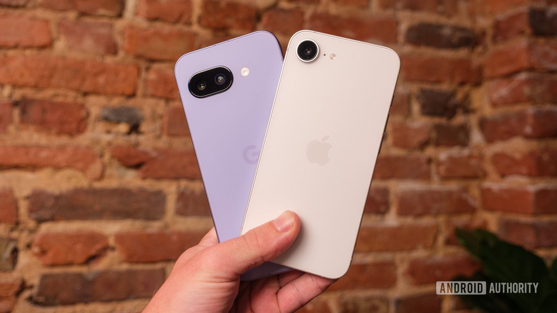 Google Pixel 9a vs iPhone 16e in hand