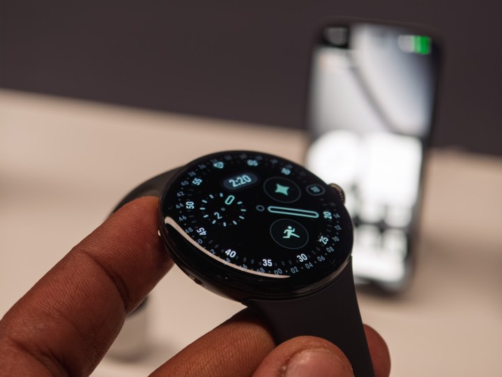 Google Pixel Watch 4 in black in the hand