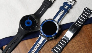 A Huawei Watch GT 6 Pro rests next to a Huawei Watch Ultimate 2