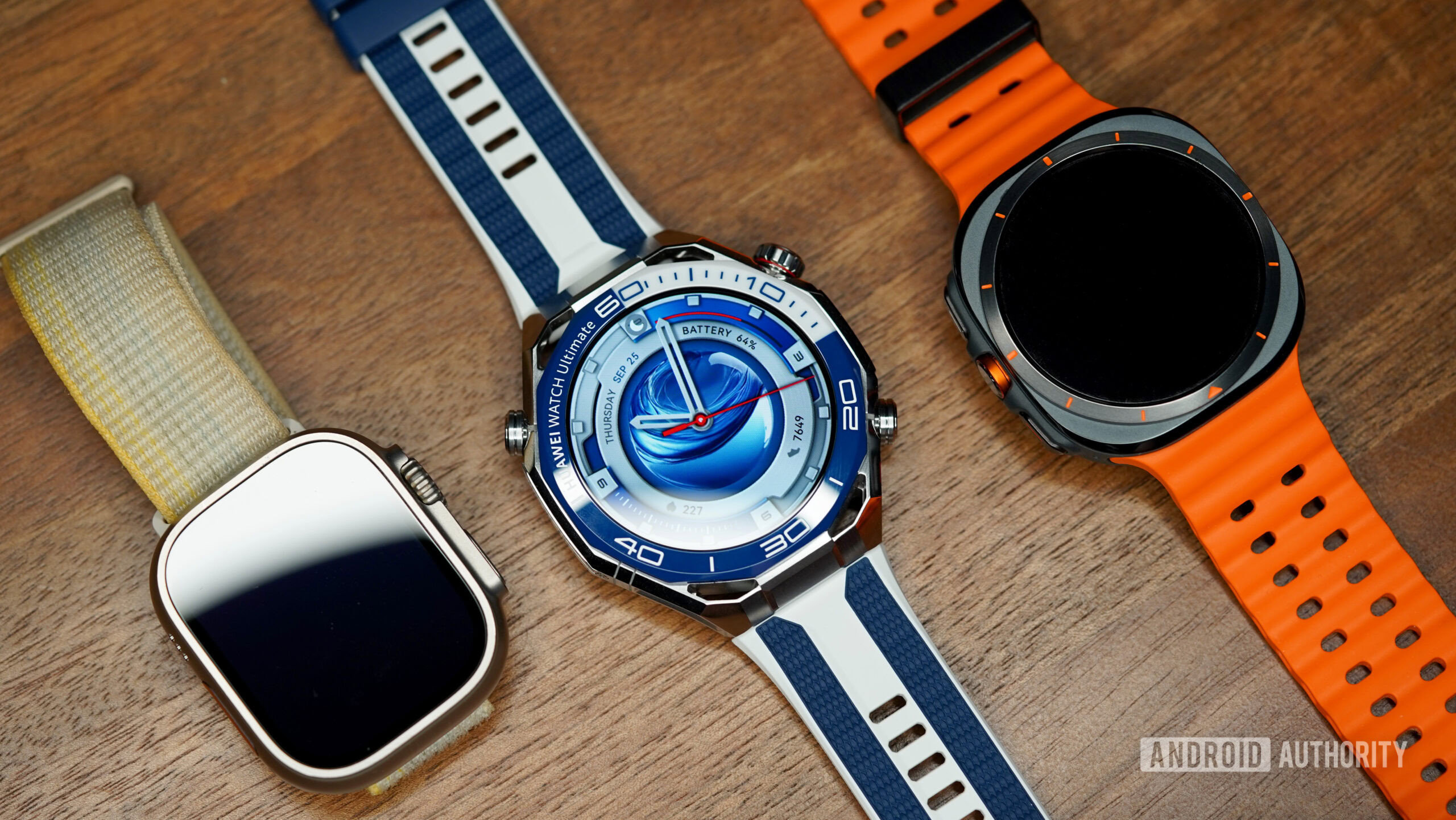 A Huawei Watch Ultimate 2 rests alongside alternatives from the market.