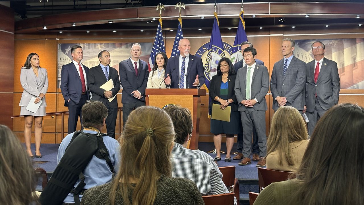 On Capitol Hill, a bipartisan coalition of lawmakers introduce a consensus bill that would restrict members of Congress and their relatives from knowingly engaging in stock trades. (Spectrum News 1/Reena Diamante)
