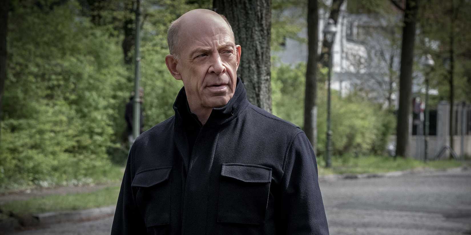 JK Simmons looking off to the side in suspicion in season 1 of Counterpart.