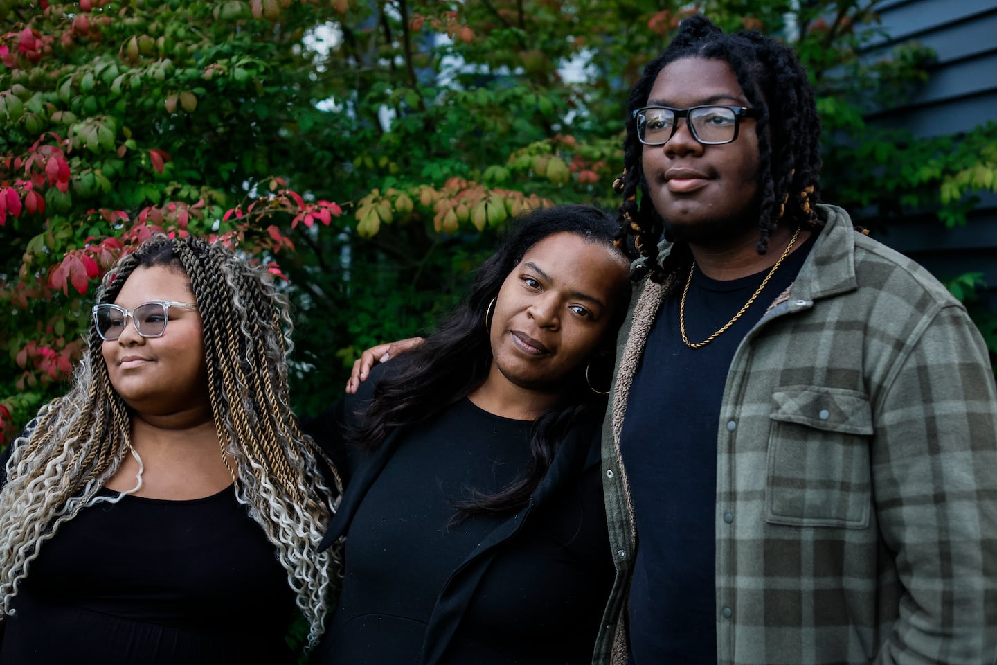 Cheryl Lloyd, center, lives apart from her children because she can’t afford an apartment big enough for them all in Randolph, a Boston suburb that has the highest eviction rate of any Massachusetts community.