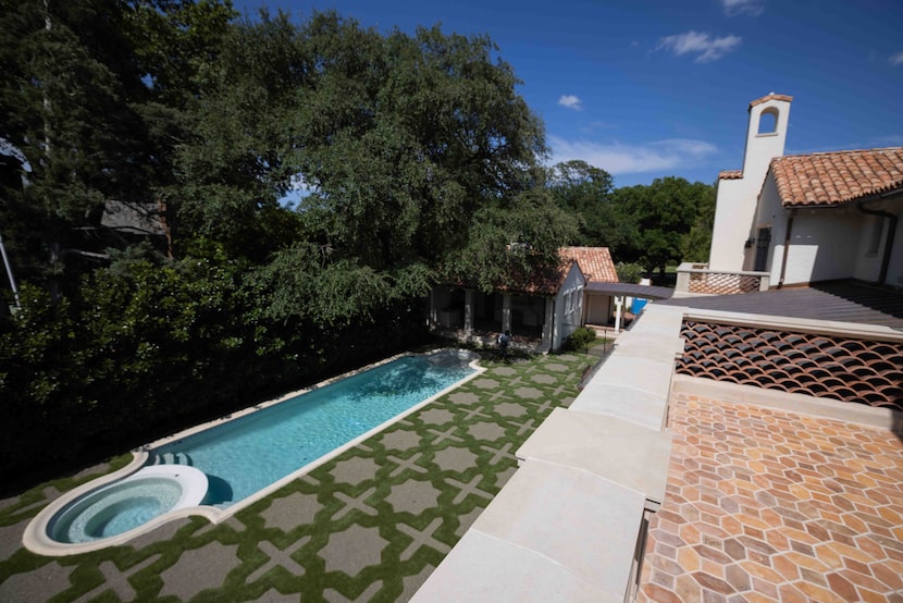 Landscape architect Harold Leidner designed the stately and serene backyard of 4400 Belfort...