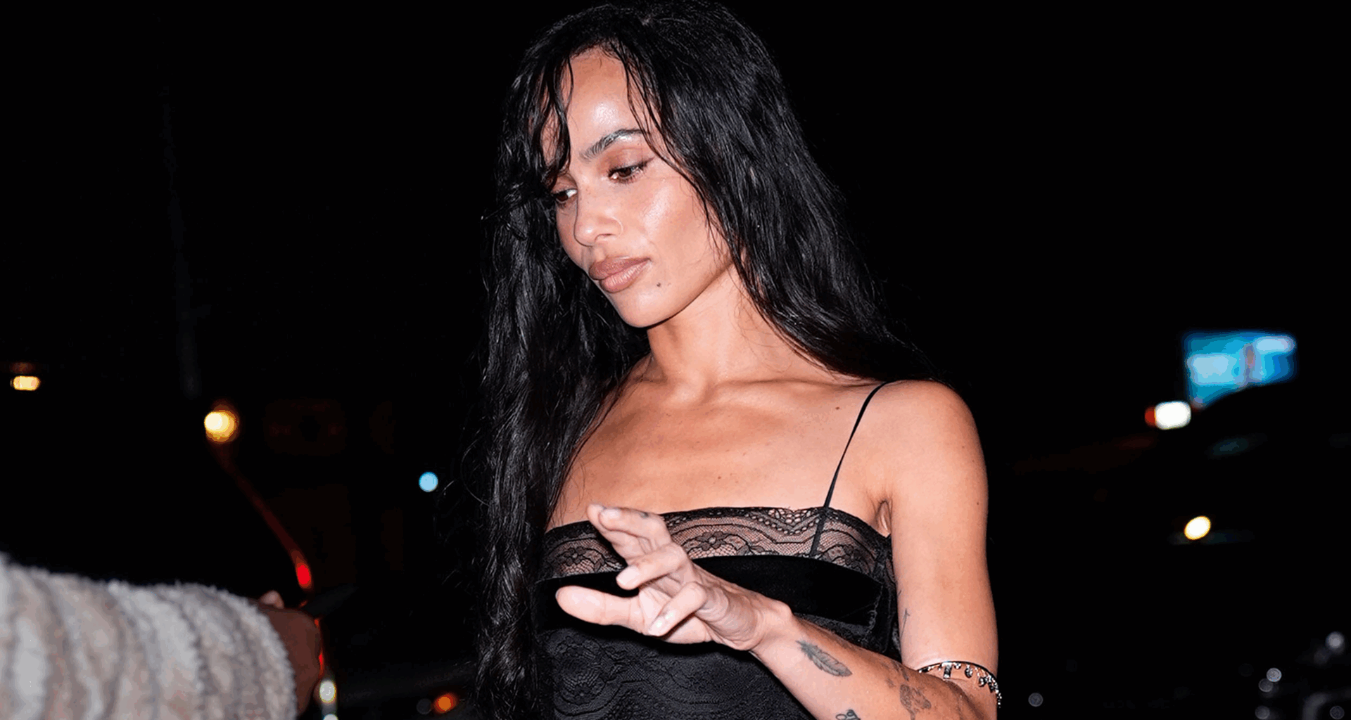 Zoë Kravitz attended a Jessica McCormack New York Fashion Week event in a lingerie-inspired Saint Laurent LBD