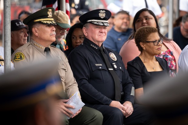 L to R, LA sheriff Robert Luna, LAPD chief of...