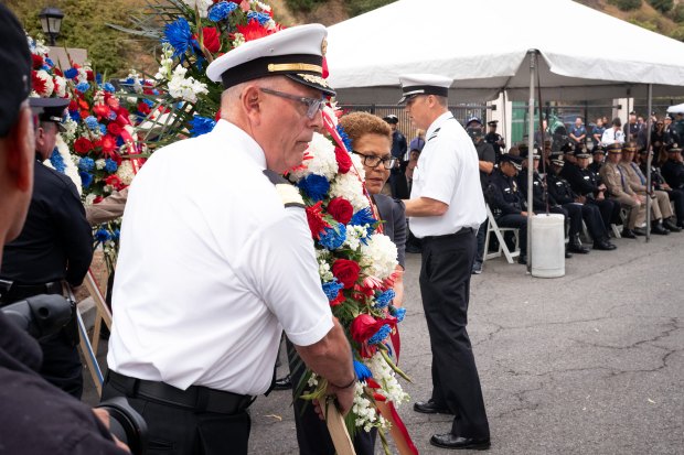 Interim LA city fire chief Ronnie Villanueva and LA mayor...