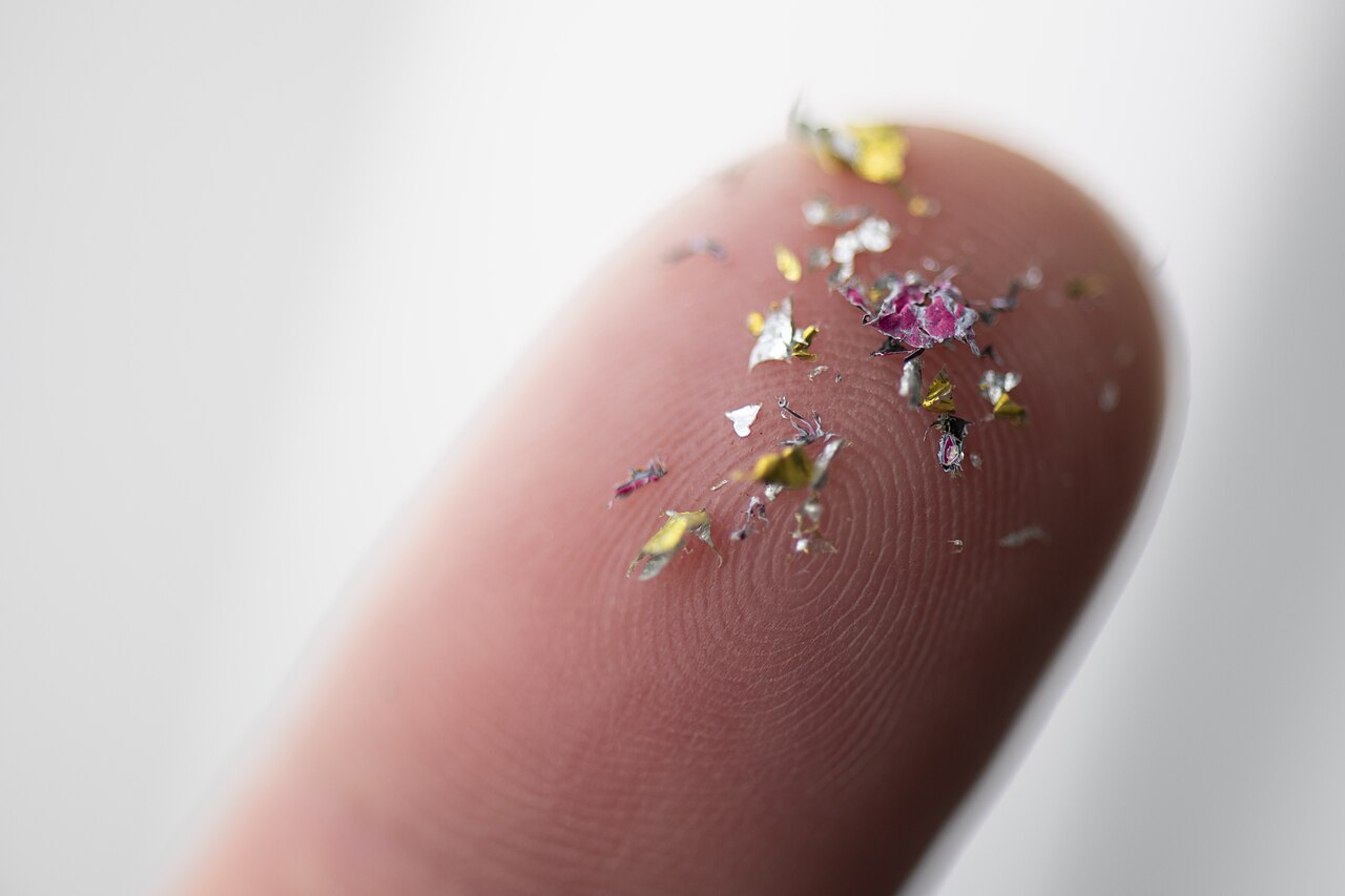 microplastics on a finger