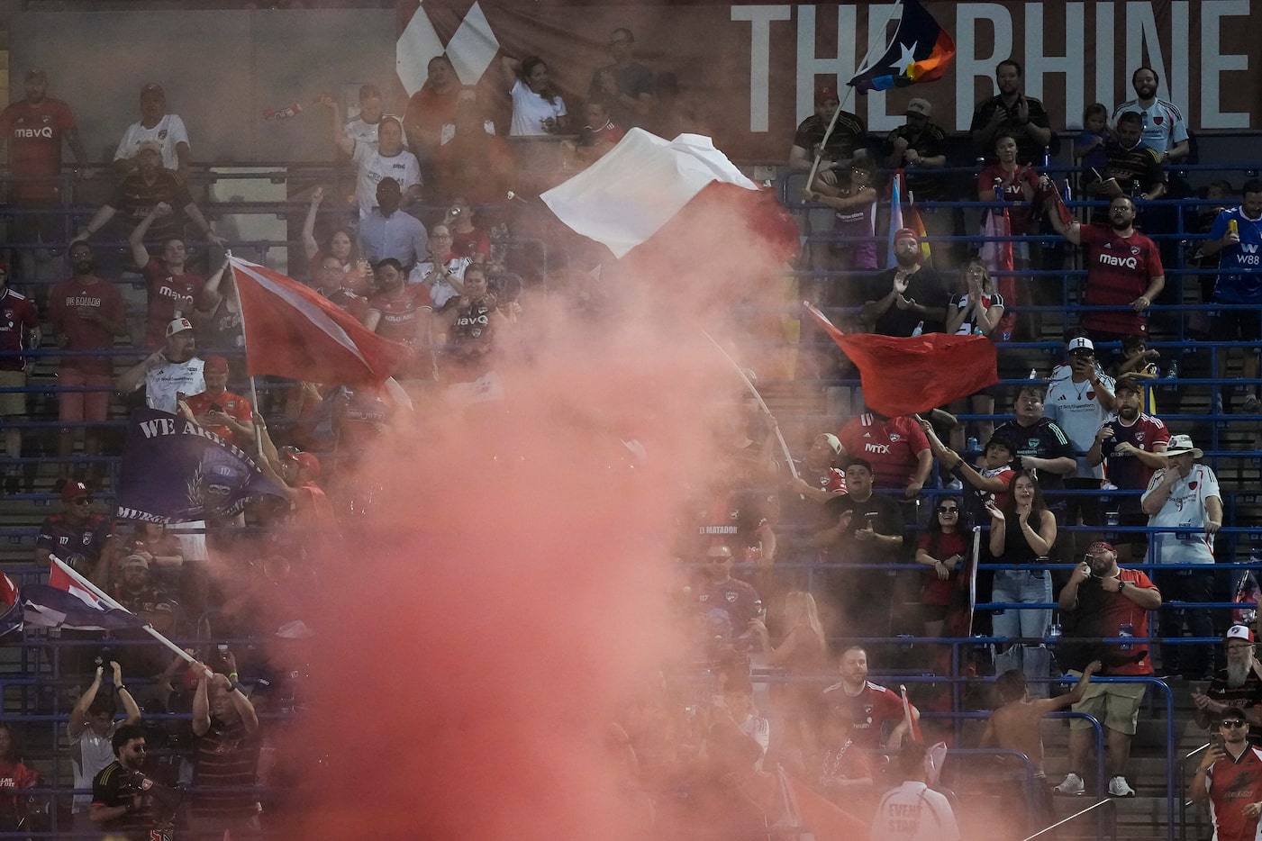 FC Dallas supporters celebrate a goal by forward Petar Musa during the first half of an MLS...