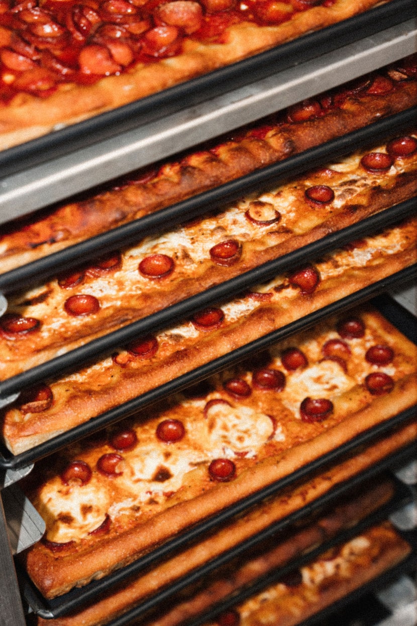 Prince St. Pizza serves pizzas whole or by the slice. Options include Spicy Vodka, a...