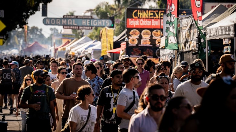 A crowd at a street festival 