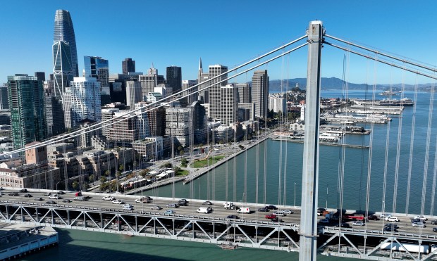In an aerial view, cars drive by the San Francisco...
