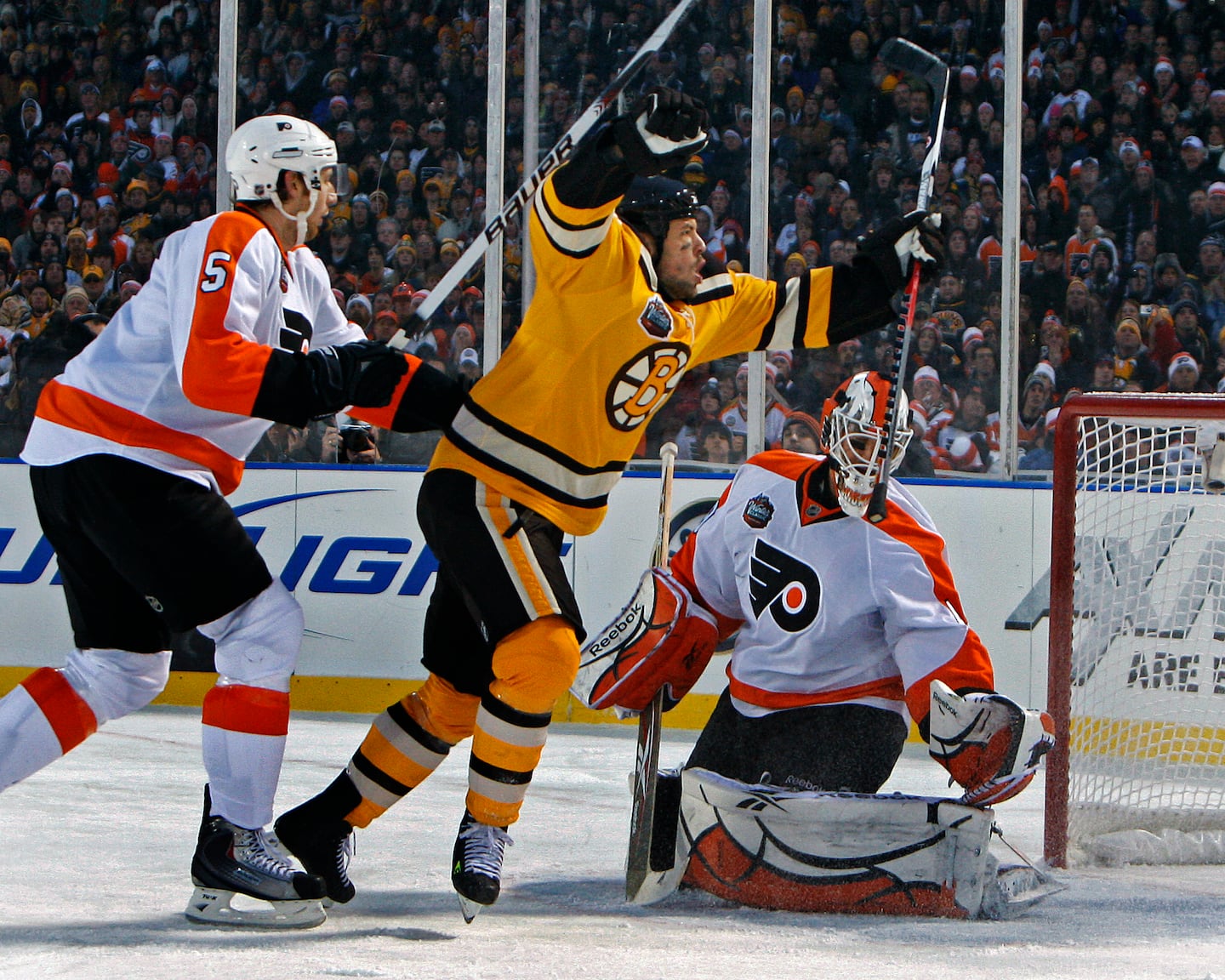 Marco Sturm (center) scored 106 goals, including in overtime of the Winter Classic at Fenway Park in 2010, during parts of five seasons with the Bruins from 2005-10.