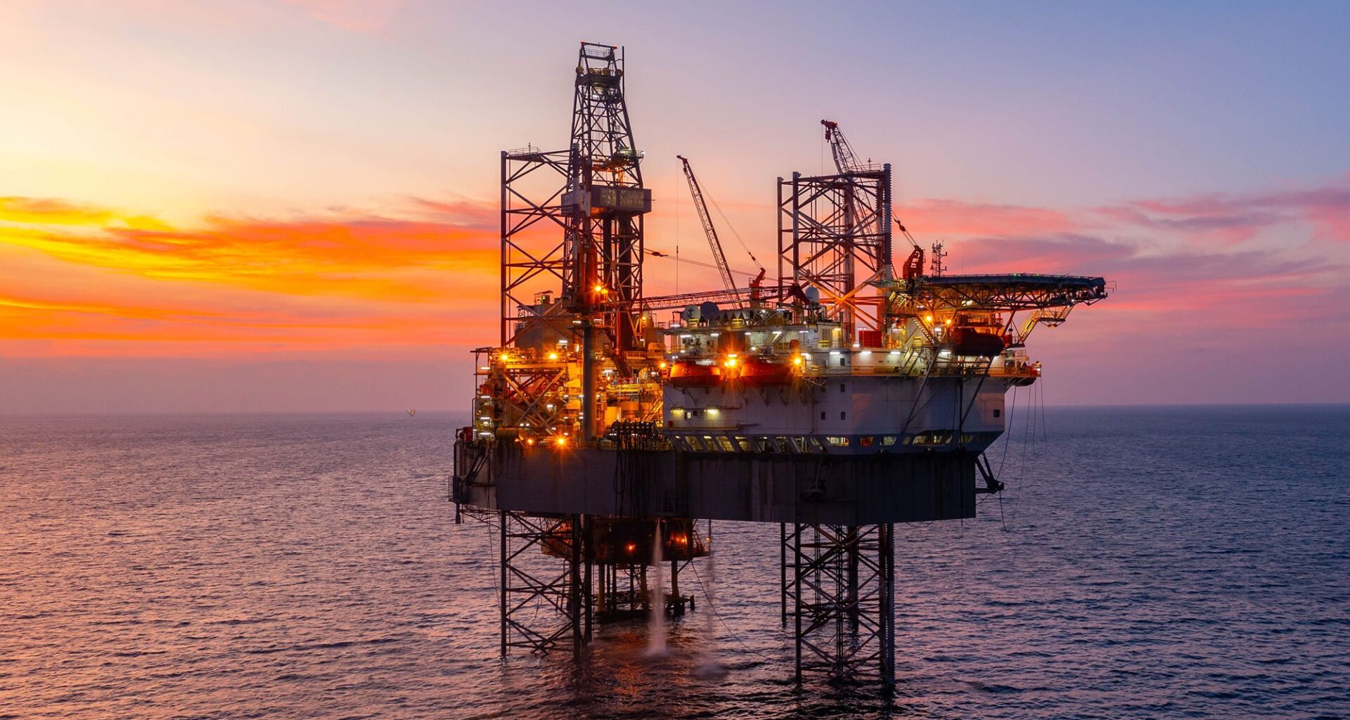 Oil Drilling Rig Sunset