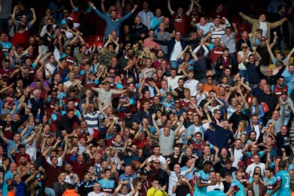 LIVERPOOL, ENGLAND - Saturday, August 29, 2015: West Ham United supporters celebrate a third goal against Liverpool scored by Diafra Sakho during the Premier League match at Anfield. (Pic by David Rawcliffe/Propaganda)
