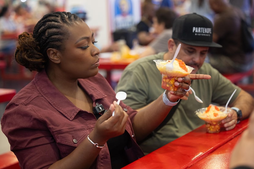 Guest judge Tiffany Derry holds up the Chill & Thrill Delight while tasting it during the...