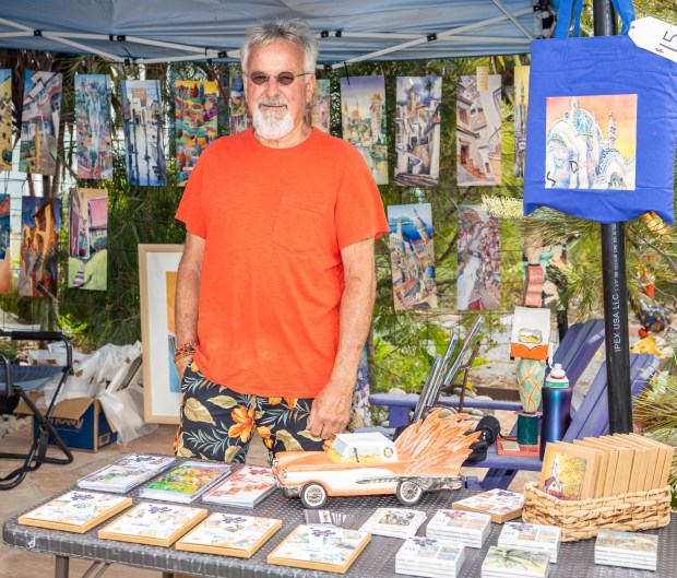 Mark Smith with his artwork. (Milan Kovacevic)