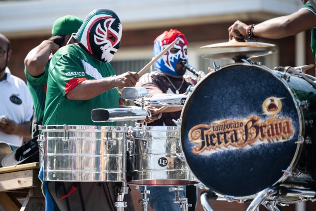 Chicago-based Tamborazo Tierra Brava peform from the back of a float during the Fiestas Patrias Parade in East Chicago on Sunday, Sept. 15, 2024. (Kyle Telechan/for the Post-Tribune)