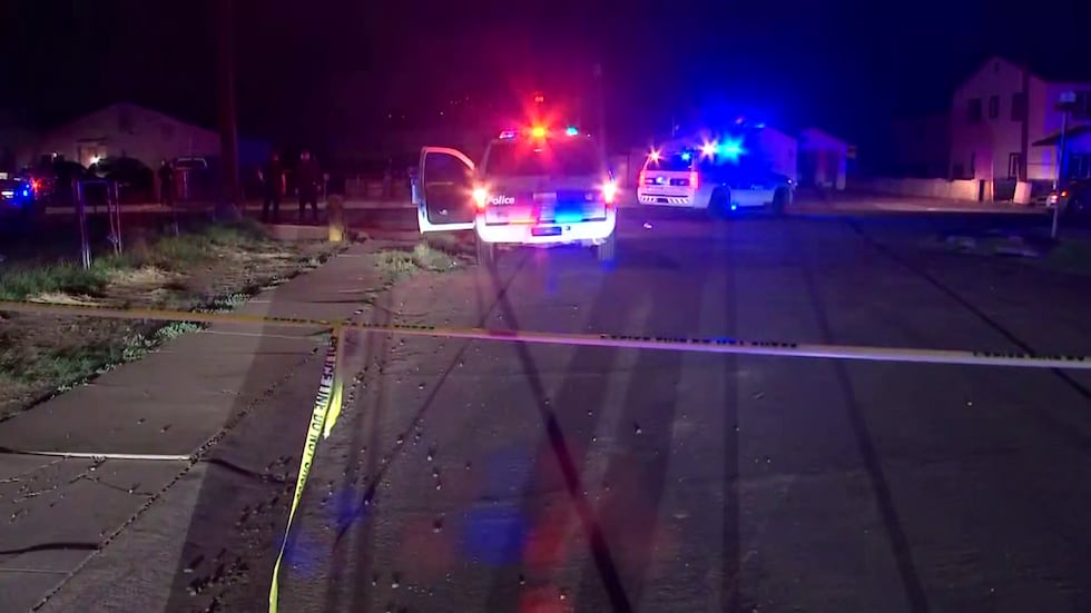 Several Phoenix PD patrol units and crime scene tape could be seen near some homes on Weir...