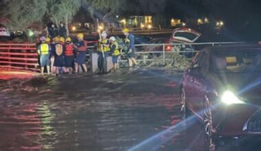 2 rescued from cars trapped in flooded Phoenix wash