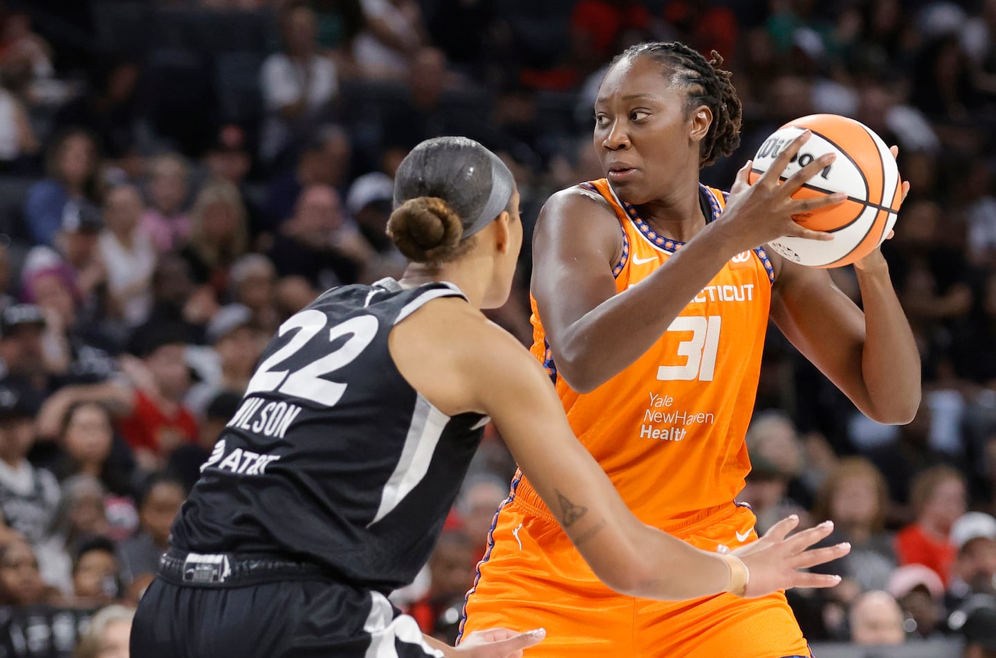 Tina Charles (right) is averaging a team-high 16.6 points per game in her second stint with the Connecticut Sun.