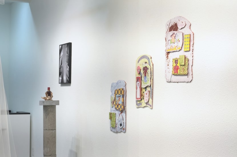 Day Brierre's clay slabs hang on the walls at Tubman Gallery, resembling pages from a diary,...