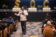 Principal Willie F. Johnson speaks as he welcomes teachers back at South Oak Cliff High...