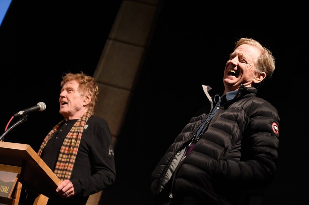 PARK CITY, UT - JANUARY 22: Sundance Institute President/Founder and actor Robert Redford (L) and James Redford speak onstage at the New Climate Lunch Roundtable on day 4 of the 2017 Sundance Film Festival at Wahso Asian Grill on January 22, 2017 in Park City, Utah. (Photo by Matt Winkelmeyer/Getty Images for Sundance Film Festival)