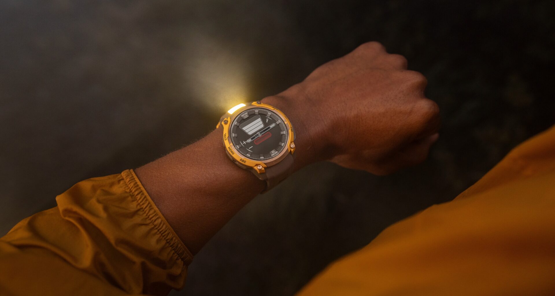 A photo of the Garmin Instinct Crossover AMOLED watch with the flashlight active on a person