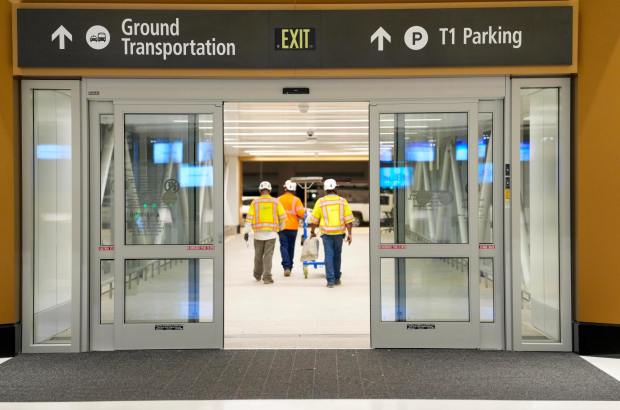 San Diego International Airport will welcome the first flights to arrive at the new Terminal 1. Construction workers leaving the area in San Diego International Airport on Monday, Sept. 22, 2025 in San Diego, California. (Alejandro Tamayo / The San Diego Union-Tribune)
