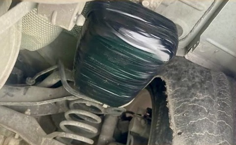The Tijuana Public Safety Department reported on Sept. 16 that a man called the police after finding a GPS tracker and packages of drugs under his vehicle. (Tijuana Public Safety Department)