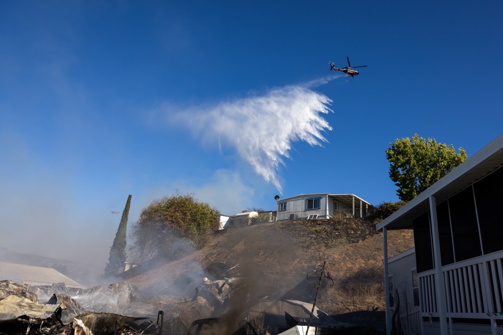 Evacuations ordered as fire in Lakeside burns structures