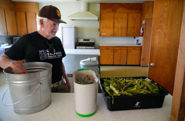 John Elder makes compost at the Good Shepherd Ministry Center...