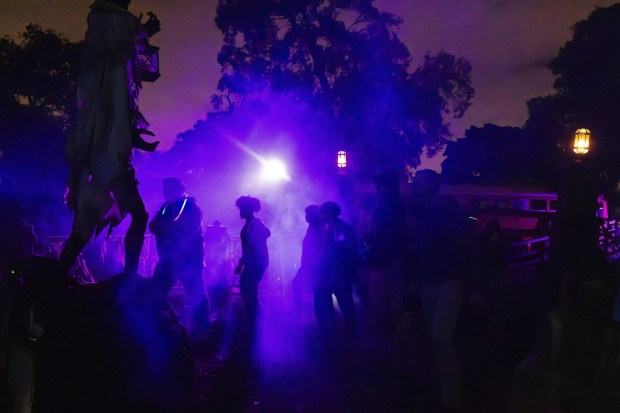 Guests walk through The Haunted Trail of Balboa Park on Saturday, Sept. 30, 2023 in San Diego, CA. (Meg McLaughlin / The San Diego Union-Tribune)