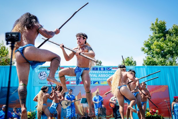 Chamoro dance group,Kutturan, fromLong Beach, performs during the Pacific Islander Festival at Ski Beach on Mission Bay on Saturday, Sept. 2025. The festival featrured foodbooths, atras and craftes booths and performers form several Pacific Island Nations. ( Photo by Sandy Huffaker for The San Diego Union-Tribune)