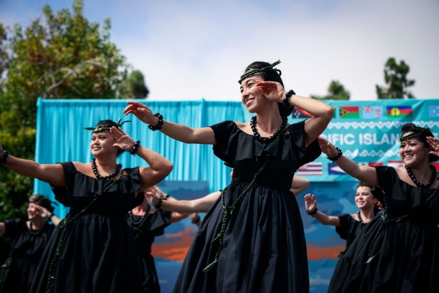 A Hawaiian dance group performs during the Pacific Islander Festival at Ski Beach on Mission Bay on Saturday, Sept. 2025. The festival featrured foodbooths, atras and craftes booths and performers form several Pacific Island Nations. ( Photo by Sandy Huffaker for The San Diego Union-Tribune)