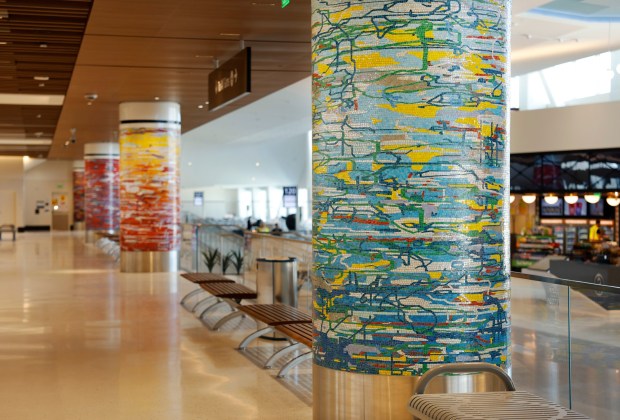 A Day in the Sun by Amy Ellingson, a mosaic that celebrates San Diego's natural and coastal environment, is part of the public arts displayed at the new Terminal 1 at San Diego International Airport. (K.C. Alfred / The San Diego Union-Tribune)