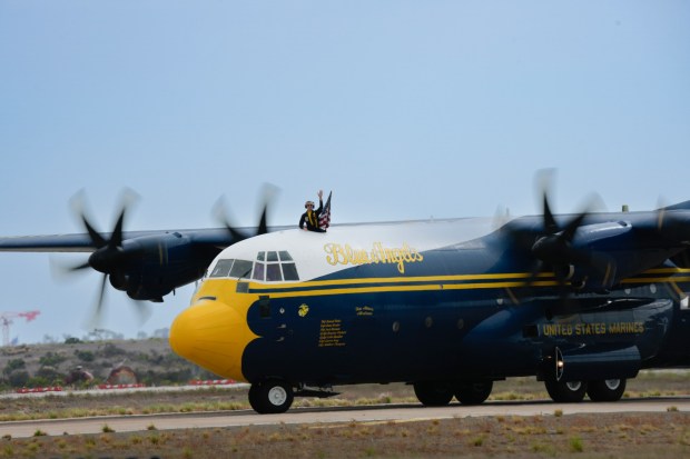 Following the Navy Blue Angels C-130 "Fat Albert" demonstration flight, the C-130 taxis down the runway for aviation fans to take one final view at the Miramar Air Show 2025. The event, which includes vintage aerial aircraft, displays, and immersive experiences, runs through Sunday. (Nelvin C. Cepeda / The San Diego Union-Tribune)