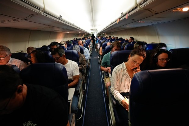 Airline passengers arriving from San Jose, California, onboard Southwest Airlines flight 4298. The passengers are among the first group to arrive at the new Terminal 1 of San Diego International Airport. (Nelvin C. Cepeda / The San Diego Union-Tribune)