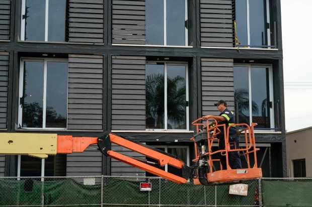 About 2,000 units of factory housing like the units being installed at 3743 4th Ave. have either been installed, are in the process of being built or are being reviewed for approval by San Diego city officials. (Alejandro Tamayo / The San Diego Union-Tribune)