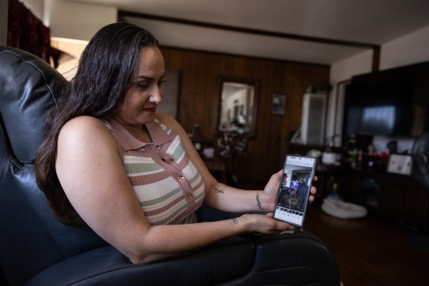 Carina Mejia shares a video of his father singing karaoke on Sunday, Aug. 24, 2025 in San Diego, CA. Victor Varela Avila, 69, was detained after returning with his wife from visiting their son in Japan. ....The family shared stories about Avila. How he likes to sing karaoke, box in the back yard and how he has a favorite chair he sits in. (Ana Ramirez / The San Diego Union-Tribune)