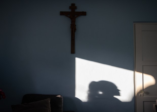 Lupita poses for a portrait on Tuesday, Aug. 19, 2025 in San Diego, CA. Lupita's husband was deported to Mexico in Feb. and she now takes care of her children alone. She said she gets her strength from her faith. (Ana Ramirez / The San Diego Union-Tribune)