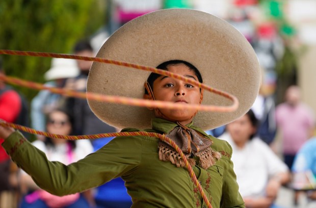 Marcos Garcia shows off his fancy lasso work during the Mexican Independence celebration held at the Old Globe Plaza in Balboa Park on Saturday, Sept. 13, 2025, in San Diego, CA.  (Nelvin C. Cepeda / The San Diego Union-Tribune)