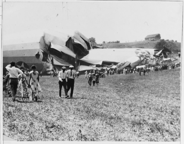 Members of the public and Navy personnel visit the USS Shenandoah's crash site in Noble County, Ohio, on Sept. 3, 1925. (Naval History and Heritage Command)