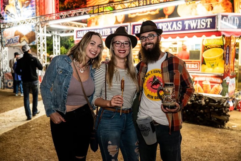 Revelers enjoy beer and sausage at Wurstfest in New Braunfels.