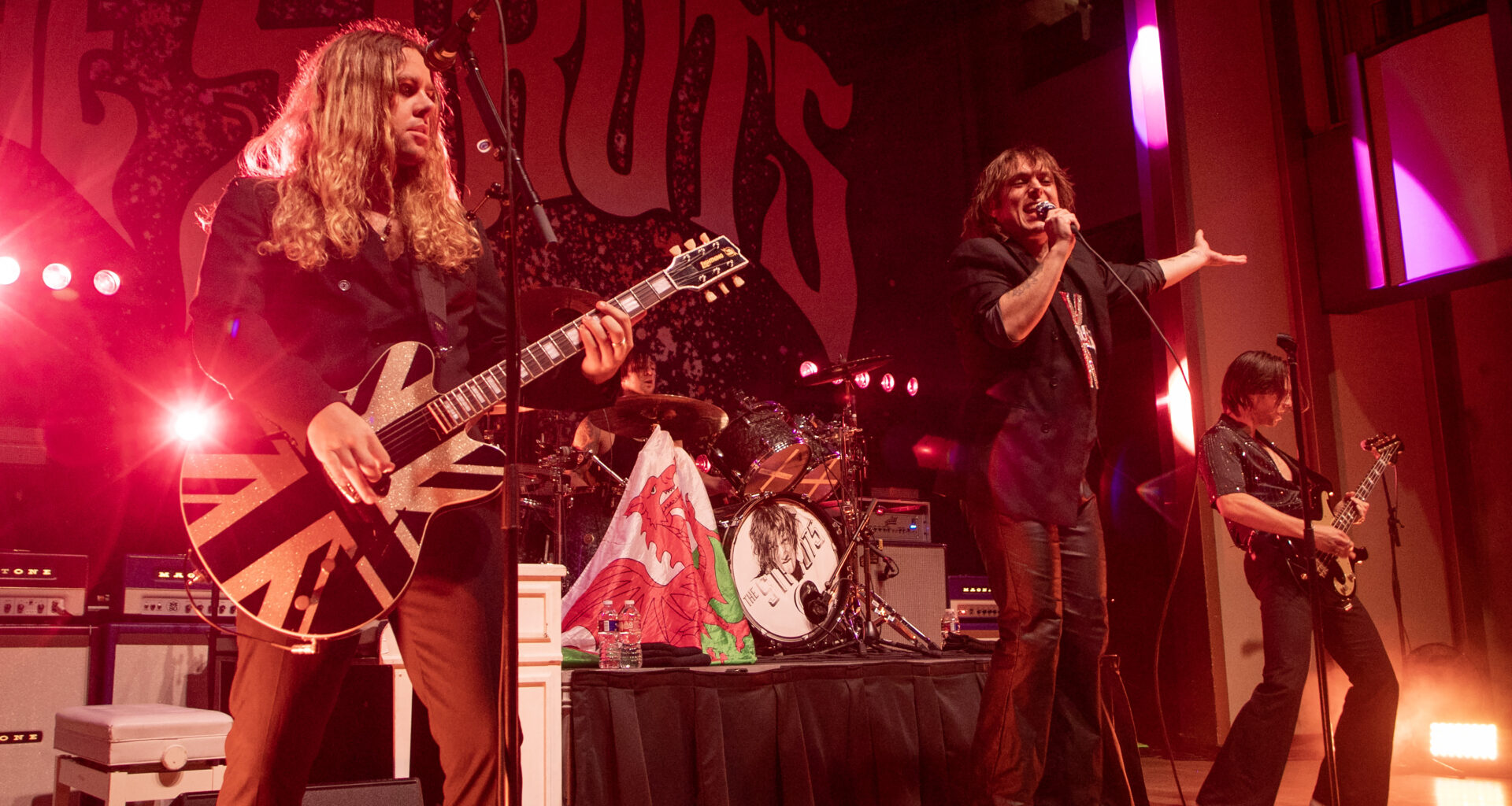 Band jumping on stage
